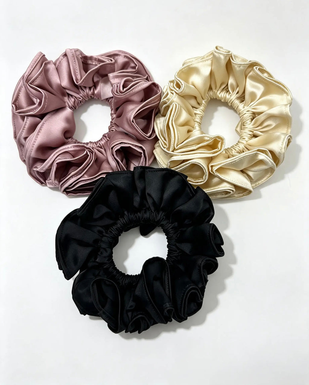 The 3-Piece Deluxe Ruffle Jumbo Bundle Neutral Edition - ZENORI mulberry silk scrunchies in dusty mauve, champagne and black
