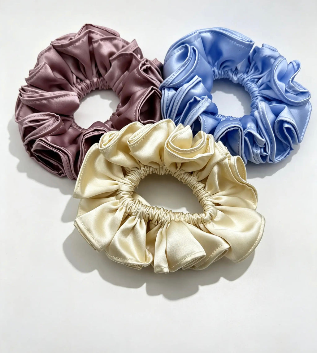 The 3-Piece Deluxe Ruffle Jumbo Bundle - ZENORI mulberry silk scrunchies in dusty mauve, periwinkle blue and champagne